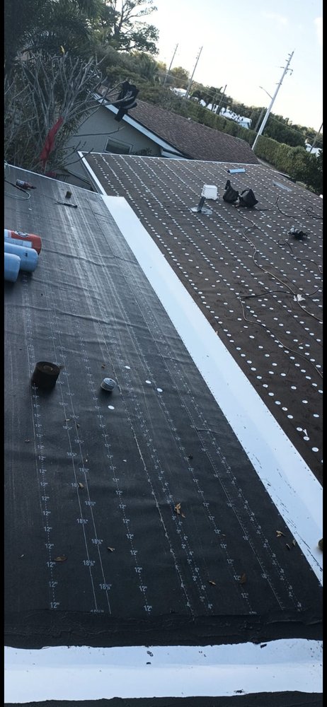 Slide of Francis Roofing Solutions