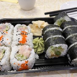 Kaoru Sushi - L-R: Spicy Hamachi Hand Roll (not spicy) and Veggie Lover Roll (delicious and fired)