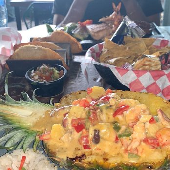 La Playita - Pina rellenda, complementary chips, empanadas and papas fritas (fries) - Seafood Near Me - Cancún, ROO La Playita - Pina rellenda, complementary chips, empanadas and papas fritas (fries) - Seafood Near Me - Cancún, ROO