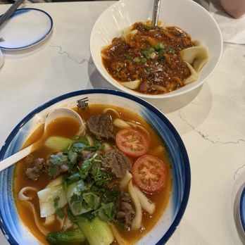 Highland Noodles - Beef w/ tomato noodle soup (hand cut noodles) & spicy crawfish noodles (flat noodles) - Noodles Near Me - Milpitas, California Highland Noodles - Beef w/ tomato noodle soup (hand cut noodles) & spicy crawfish noodles (flat noodles) - Noodles Near Me - Milpitas, California