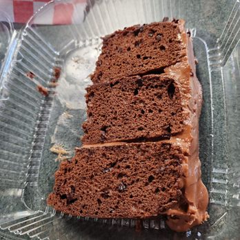 Falcone's Pizzeria - Joni's Signature Chocolate Cake with several yummy bites out of it. - Italian Near Me - Oklahoma City, Oklahoma Falcone's Pizzeria - Joni's Signature Chocolate Cake with several yummy bites out of it. - Italian Near Me - Oklahoma City, Oklahoma