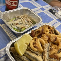 Fried calamari and anchovies. Fried calamari and anchovies.