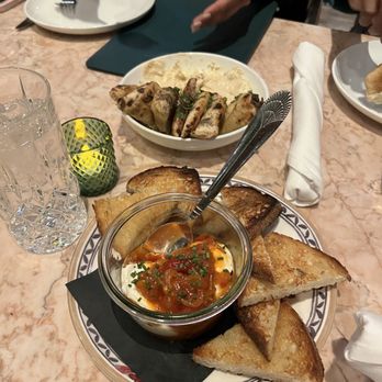 Paradiso - Marinated burrata and hummus w/ pita bread - Bars Near Me - Dallas, Texas Paradiso - Marinated burrata and hummus w/ pita bread - Bars Near Me - Dallas, Texas