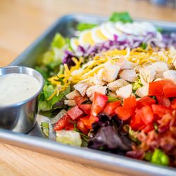 Shawii Kitchen - Strawberry Chicken Salad - Chicken, Mixed Greens, Avocado, Tomatoes, Sliced Egg, Onions, Bacon, Cheddar, Croutons