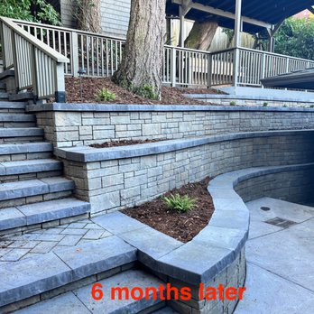 Oz Outdoor Living Spaces - The stairway + new retaining walls after 6 months (Jan 2022). Paver tops could use a post-snow pressure-wash, but holding up very well! - Landscape Architects or Designers Near Me - Seattle, Washington