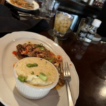 Moonshine Grill - Blackened salmon with grits! Best I've had and I've been around the world. - Southern Near Me - Austin, Texas