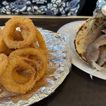 King Kong Restaurant - Gyro sandwich no tomatoes with onion rings - Mediterranean Near Me - Lincoln, Nebraska King Kong Restaurant - Gyro sandwich no tomatoes with onion rings - Mediterranean Near Me - Lincoln, Nebraska