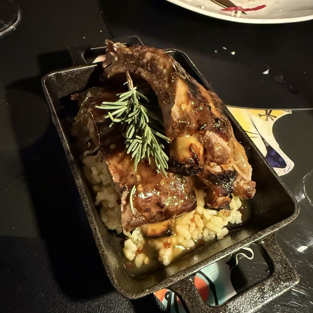 Miró Tapas - Costillas De Cerdo De Miel Picantes, slow cooked ribs over seasoned rice. 5 stars! - Tapas/Small Plates Near Me - Tacoma, Washington