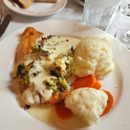 Stuffed trout with spinach and artichokes