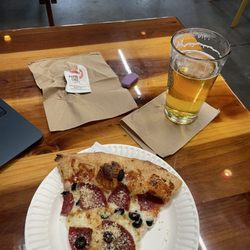 Pizza Port Brewing - Pizza of the day: Salami and Olives paired with a Pinky Lager