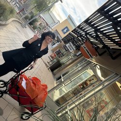 Le Creuset Outlet Store - Joan embodying angelic features assisting with transport of amazing purchases to my vehicle.
