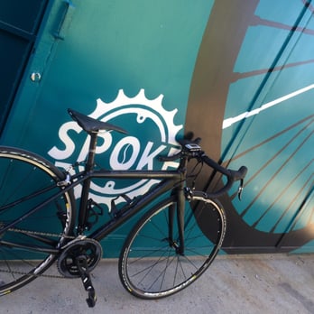 Spoke - My bike on their metal gate facing the street/neighborhood - Breakfast & Brunch Near Me - Los Angeles, California