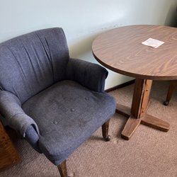 Jim Butler Inn & Suites - Chairs are stained and there's no padding left in the seats.