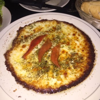 Barra Ñ - Oven baked provolone cheese - Argentine Near Me - Chicago, Illinois