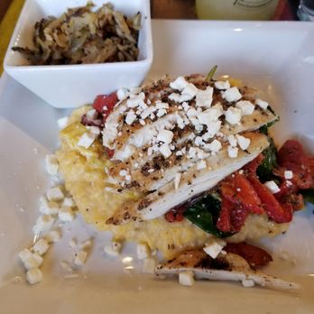 Lunch. Supper! - The Dandelion Café: Grilled chicken, scrambled eggs, sautéed spinach, roasted red peppers,  red onions, and feta over cheese grits - New American Near Me - Richmond, Virginia