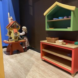 Main Street Children's Museum - The kitchen/house play area. Not a lot of items to use - or many are out of reach for any kid.