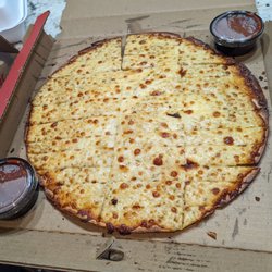 Red's Savoy Pizza - $15 pizza fries.  Terrible.  Super thin hard like plastic crust with tiny bit of cheese. Little to no flavor.  $15 for this is a crime