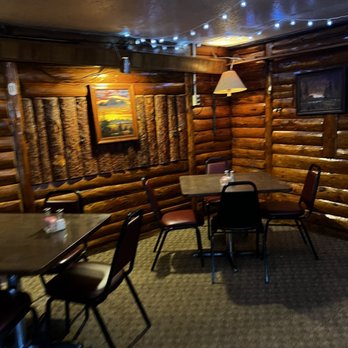 Los Chavalos - a dining room in a log cabin - Mexican Near Me - South Fork, Colorado