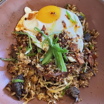 Husk - Ribs over chili flakes rice and runny egg on top. Spicy goodness - American Near Me - Charleston, South Carolina Husk - Ribs over chili flakes rice and runny egg on top. Spicy goodness - American Near Me - Charleston, South Carolina