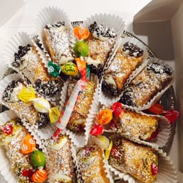 Mini Cannoli assortment on silver tray Mini Cannoli assortment on silver tray