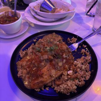 Bourbon St. Cafe - Blackened Catfish over Jambalaya. - Seafood Near Me - Tulsa, Oklahoma Bourbon St. Cafe - Blackened Catfish over Jambalaya. - Seafood Near Me - Tulsa, Oklahoma