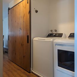 Finished/installed door. (Upgraded shelves and cabinets for laundry side and jacket/water heater side next on my project list ) Finished/installed door. (Upgraded shelves and cabinets for laundry side and jacket/water heater side next on my project list )