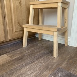 Stonemann Flooring - Detail of vinyl planking to existing cabinet