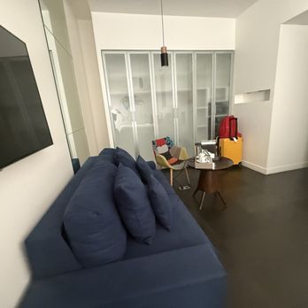 1K Paris Hotel - Photo 10: Sofa and wardrobe closet in Deluxe Double Room - Hotels Near Me - Paris, 75