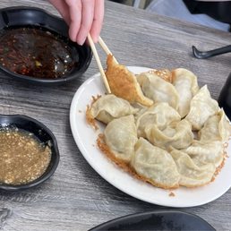 Pork and pickled cabbage pan fried dumplings Pork and pickled cabbage pan fried dumplings