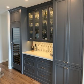 Willard Woodworks - a kitchen with gray cabinets and white countertops - General Contractors Near Me - Norco, California Willard Woodworks - a kitchen with gray cabinets and white countertops - General Contractors Near Me - Norco, California