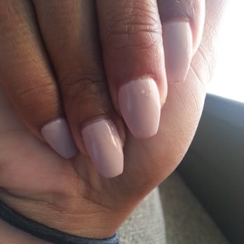 Angel Nails - Lint and bubbles on the middle nail - Nail Salons Near Me - Monterey, California