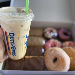 Maple, chocolate, sprinkles , sugar, and a filled jelly donut. Plus my Dutch coffee to go with it.