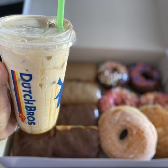 Goatstar Donuts and Coffee - Maple, chocolate, sprinkles , sugar, and a filled jelly donut. Plus my Dutch coffee to go with it. - Donuts Near Me - Caldwell, Idaho