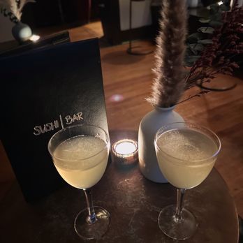 Sushi Bar - Waiting room with peach Bellinis - Sushi Bars Near Me - Austin, Texas