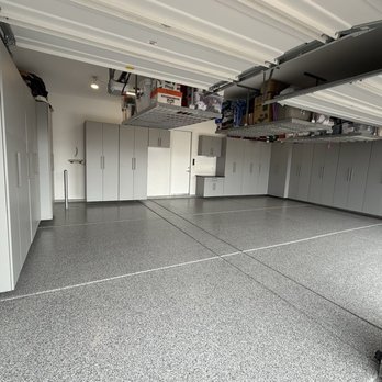 Garaginization - 3rd car garage with flooring, cabinets and overhead racks. - Cabinetry Near Me - Las Vegas, Nevada Garaginization - 3rd car garage with flooring, cabinets and overhead racks. - Cabinetry Near Me - Las Vegas, Nevada