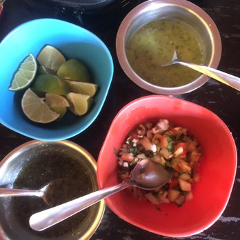 Taquería Honorio - Toppings; only the bottom left is spicy - Mexican Near Me - Tulum, ROO Taquería Honorio - Toppings; only the bottom left is spicy - Mexican Near Me - Tulum, ROO