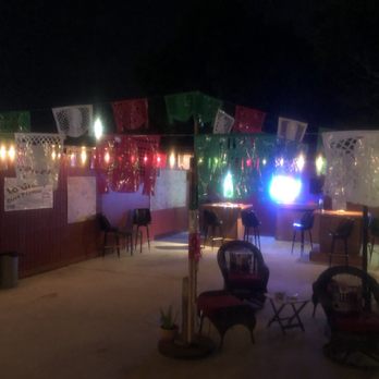 La Granja Disco - More patio area with papel picado colores de Mexico - Dance Clubs Near Me - Houston, Texas
