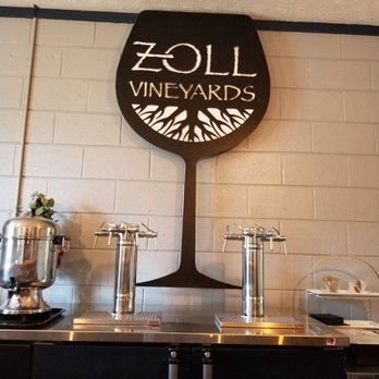 Zoll Vineyards - a wine glass on the wall - Wineries Near Me - Dutton, Virginia