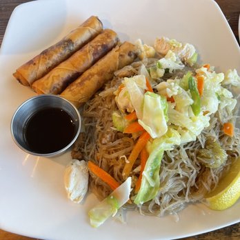 Elsie's Egg Rolls - Pancit Noodles combo: Filipino Noodles with Pork, topped with chicken and vegetables and three Lumpia (egg rolls) - Filipino Near Me - Hutto, Texas