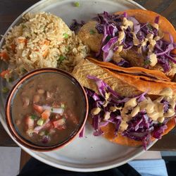 Fried Mahi Fish Tacos with a side of Charro beans and Spanish rice