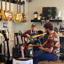 Me, and Moe shredding the blues. Surrounded by gorgeous Gibson Les Pauls Me, and Moe shredding the blues. Surrounded by gorgeous Gibson Les Pauls
