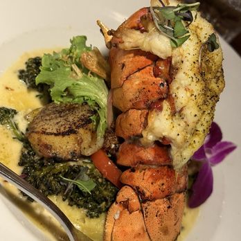 Station 16 - Seared scallops with a lobster tail added. - Cocktail Bars Near Me - Elk Grove, California