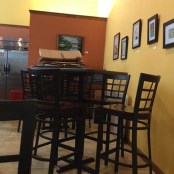 The Coffee Studio - Back of the shop. Random cardboard on table - Cafes Near Me - Stevens Point, Wisconsin