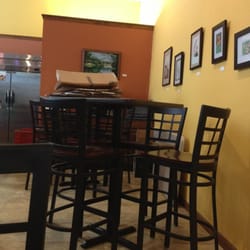 The Coffee Studio - Back of the shop. Random cardboard on table