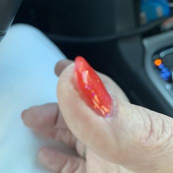 W Nails - Thumb- you can see the indent of my long nail he cut off. He rounded the edges. - Nail Salons Near Me - Osage Beach, Missouri