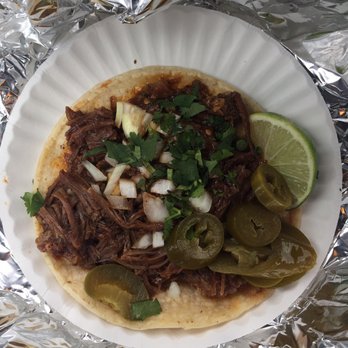 Tacos Jalisco - a plate of food on tin foil - Food Trucks Near Me - Warsaw, Indiana Tacos Jalisco - a plate of food on tin foil - Food Trucks Near Me - Warsaw, Indiana