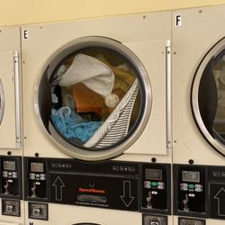 Clean Cycle Laundromat - Dryer eating towels. I keep opening the door to yank them out of the front of the barrel