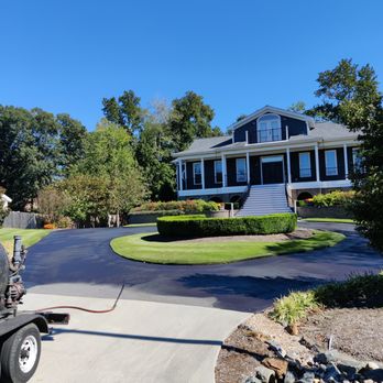 Lotmarkers - Residential seal coat is both prolonging the life of the asphalt and adding curb appeal. - Masonry/Concrete Near Me - Virginia Beach, Virginia Lotmarkers - Residential seal coat is both prolonging the life of the asphalt and adding curb appeal. - Masonry/Concrete Near Me - Virginia Beach, Virginia