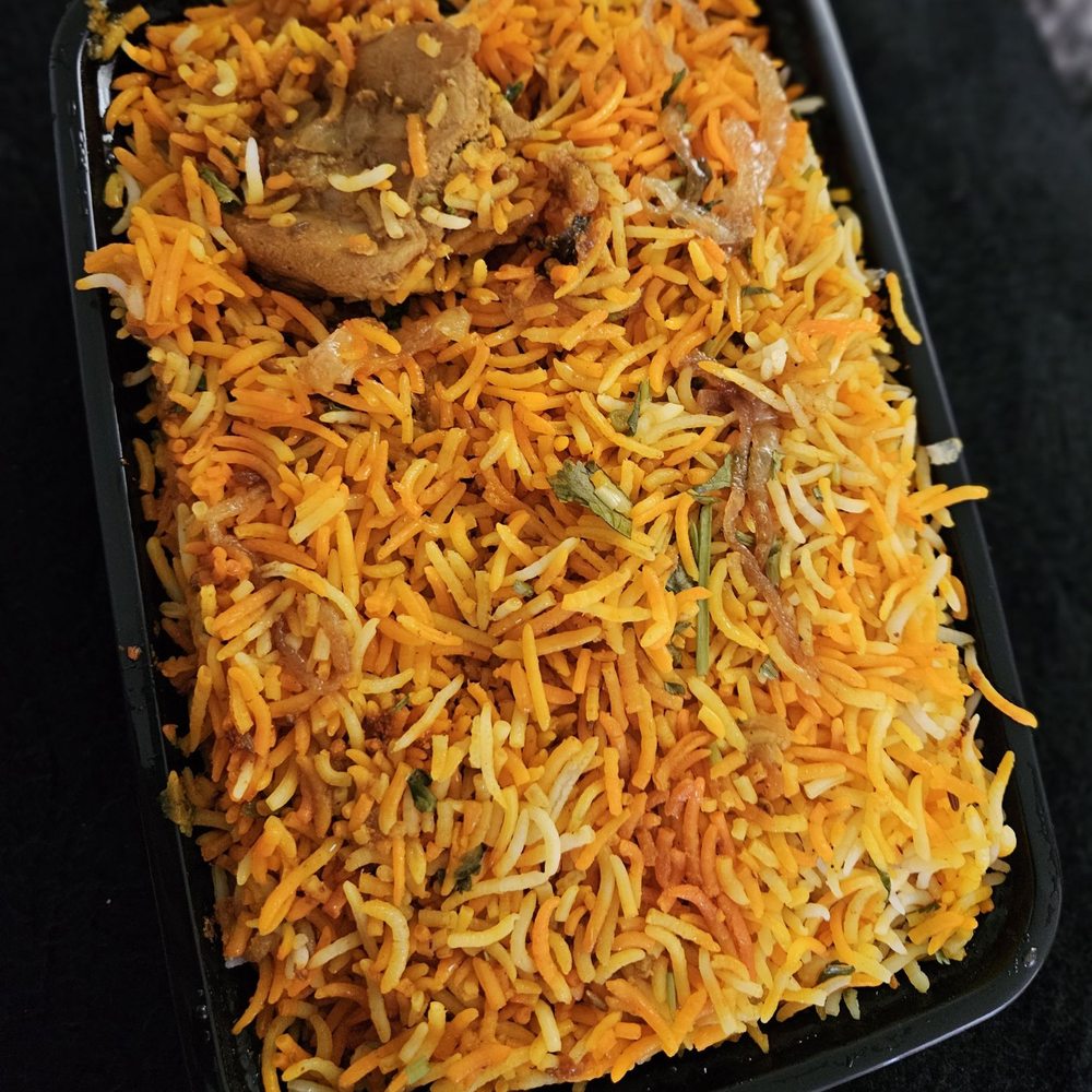 Basil Indian & Thai Grill - a close up of a dish of rice - Indian Near Me - Montclair, New Jersey Basil Indian & Thai Grill - a close up of a dish of rice - Indian Near Me - Montclair, New Jersey