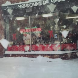 a storefront in the snow